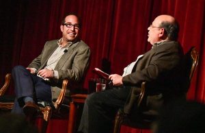 Ken Glazer, left, talks about the resilience of family businesses with St. John Fisher professor Jason Berman. Photo supplied by St. John Fisher College