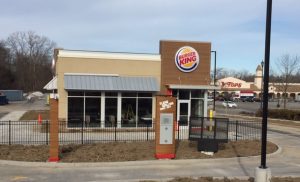 Who pays $566,000 in construction cost overruns at a new Burger King in Greece may be determined in state Supreme Court.