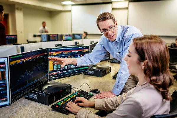 St. John Fisher College finance students gain real-life financial world experience by using Bloomberg Terminals to access investment data and analysis (provided photo).