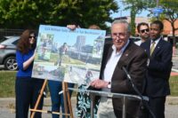 Sen. Charles Schumer, pictured here during a visit to Rochester in September, is calling for Housing and Urban Development Secretary Scott Turner to renew an agreement to renovate zombie houses in Rochester. (File photo provided by Sen. Schumer's office)