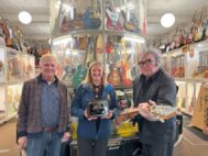 Assemblymember Sarah Clark recognizes the House of Guitars and founders and owners Bruce Schaubroeck (left) and Armand Schaubroeck with inclusion in New York State's Historic Business Preservation Registry. (Photo provided by Sarah Clark's office)