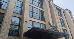 The former Hickey-Freeman building is reborn as Tailor Square and still features the Hickey-Freeman logo at the building's entrance. (Photo provided by Home Leasing)