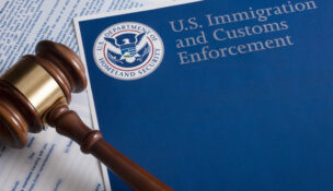 Immigration and Customs Enforcement logo with gavel