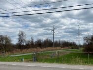 Land along Island Cottage Road in Greece is the subject of a court filing over possible contaminants in the water and soil. (File photo by Kevin Oklobzija)