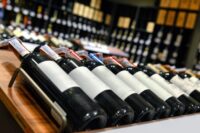 A new bill introduced in the state Senate would allow grocery stores to sell wines produced in New York, but it faces opposition from the liquor store lobby. (Photo by Depositphotos)