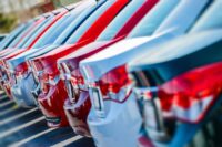 State Sen. Jeremy Cooney (D-Rochester) has introduced legislation that would require the estimated cost of tariffs to be included on window stickers of new cars. (Photo from Depositphotos)
