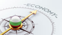 High Resolution Economy Concept with compass pointing toward the word "economy" by Depositphotos.