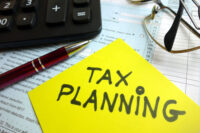 tax planning written on yellow paper (Photo by Depositphotos)