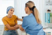 Female patient with female doctor in medical office (Depositphotos)