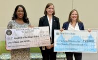 New York State Sen. Samra Brouk; Jennifer Lake, Goodwill of the Finger Lakes president and CEO, and New York State Assemblywoman Sarah Clark at the announcement of a new Goodwill store at the former Irondequoit Mall. (Photo provided by Goodwill of the Finger Lakes)
