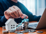 illustration of small house, coins and laptop (Depositphotos)