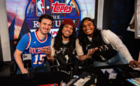 WeTheHobby CEO Zach Stanley with card break hosts Cam Turney and Aliah Walls in a studio at the firm's headquarters. (Photo provided by WeTheHobby)