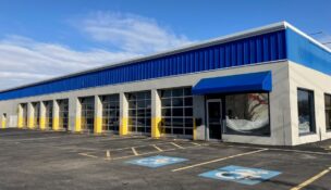 Redi Imports will establish its first location on the west side of Monroe County, moving into a former Monro Inc. location on Stone Road in Greece. (Photo by Kevin Oklobzija)