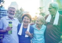 Senior citizens laughing together by Depositphotos