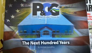 The cover of P&CG Group's book, “The Next Hundred Years.” (Photo by Kevin Oklobzija)