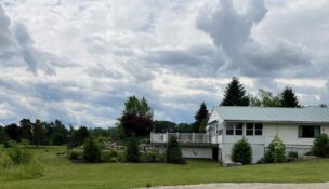 Pinewood Country Club, a nine-hole golf course in the town of Ogden that includes a bar and restaurant facilities, has been sold for $1.5 million. (Photo by Kevin Oklobzija)