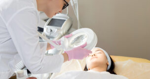 health care provider treating a patient by Depositphotos