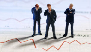 illustration of businessmen looking at line chart by Depositphotos