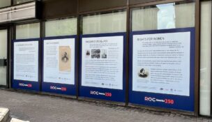 First Federal Plaza on East Main Street is one of three buildings in downtown Rochester displaying historical window decals as part of America 250. (Photo provided by Rochester Downtown Development Corp.)