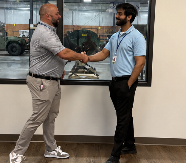 Greg Campbell, Lite Coms’s new president, greets employees during his first week on the job. (Photo provided by Lite Coms)